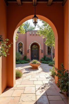 Mediterranean-style patio with terracotta and natural stone elements