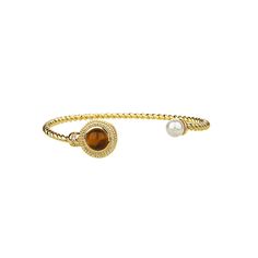 ✦Elevate your style with this stunning French Style Tiger Eye Stone Cuban Chain Bracelet. Perfect for any occasion, this chunky statement piece features a striking brown stone and a unique paperclip design on both sides. The intricate pattern and exclusive look make it the perfect gift for yourself or a loved one. Don't miss out on this blessing for your accessory collection! ----------- DETAILS ----------- - Color: Gold - Buying Option: Open Cuff/ Cuban Chain - Diameter: 21cm - Materials: Brass, 14K Gold Plated, Tiger Eye , Rhinestone - SKU: R1636 Arm Bracelets, Adjustable Bangle, Tiger Eye Stone, Cuban Chain, Cuff Bangles, Tiger Eye, Paper Clip, Chain Bracelet, Faux Pearl