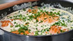 the food is prepared and ready to be cooked in the pot on the stove top