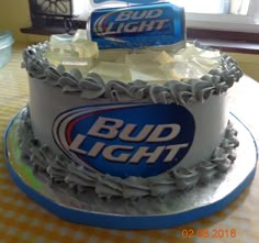 a bud light cake with frosting on top