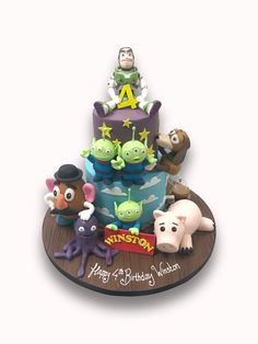 an image of a birthday cake with monsters on it