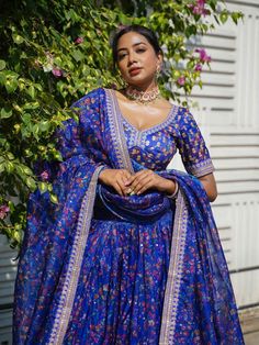 This exquisite ensemble is perfect for weddings, parties, and any ethnic occasion. The beautiful blue color in organza material, adorned with floral print work, is sure to make you the center of attention.
As for the key features, this lehenga choli set comes with a blue color art silk blouse that showcases intricate floral print work, zari, thread, and sequins embroidery. The dupatta, made of organza material, features a delicate embroidery border and floral print, adding a touch of elegance to Organza Material, Printed Organza, Reception Lehenga, Embroidery Border, Net Lehenga, Lehenga Choli Online, Delicate Embroidery, Wedding Lehenga, Sequins Embroidery