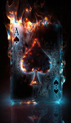 a burning ace playing card in the dark