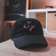 Hey there, please read! 👋🙂 * ゴースト means GHOST. * Every order is embroidered and shipped from Dallas, Texas. * Each order supports this one-person small shop. * Like our stuff? Follow our IG @EmbroideredDadHats ★ Want this on a Bucket Hat or Beanie? ★ GHOST TYPE BUCKET HAT: ➡ www.etsy.com/listing/1319021764 GHOST TYPE BEANIE: ➡ www.etsy.com/listing/1333030407 MORE HATS: ➡ www.etsy.com/shop/embroidereddadhats Details * Adult caps are one size fits all. * Unstructured and low profile fit. * 100% Black Embroidered Cotton Trucker Hat, Embroidered Cotton Fitted Hat With Curved Bill, Black Dad Hat With Curved Brim As Gift, Cotton Trucker Hat With Curved Bill As Gift, Embroidered Cotton Hat For Streetwear, Black Dad Hat Cap As A Gift, Black Dad Hat As A Gift, Black Dad Hat As Gift, Casual Black Dad Hat As Gift