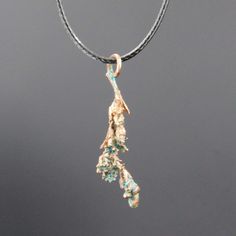 a handmade copper electroformed goldenrod flower sprig pendant with a turquoise patina Nature-inspired Patina Pendant Jewelry, Nature-inspired Jewelry With Patina As A Gift, Pools And Hot Tubs, Goldenrod Flower, Patina Copper, Plant Jewelry, Electroformed Jewelry, Green Bottle, Copper Patina