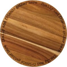 a wooden plate with words engraved on it