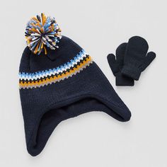 Upgrade your baby boy's cold weather accessories with this set from Capelli of N.Y. It includes a striped pom-pom beanie made from a knit fabric lined with warm fleece and a pair of matching mittens. # Pieces In Set: 2Included: 1 Hat(s), 1 MittensFeatures: LinedWarmth Factor: LightweightFiber Content: 90% Acrylic, 10% PolyesterFabric Description: KnitLining: Fully LinedLining Material: FleeceCare: Tumble Dry, Machine WashCountry of Origin: Imported Cold Weather Accessories, Pom Beanie, Baby Cold, Winter Accessories, Cold Weather, Knitted Fabric, Knit Fabric, Pom Pom