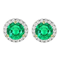 METAL SPECIFICATIONS Two Tone Gold 14K STONE SPECIFICATIONS Stone Name : Green Emerald and Diamond Stone Cut : Round Cut Stone Details : There is one round cut green emerald stone in the center approx. 2.50 carats (Approx. Dia. 8 mm) with approx. 1 carat of round cut diamonds on the sides in each earring. Crafted with natural earth mined stones. Color : Green/F Clarity : VS1 Quality : AAA Total : Approx. 7 Carats EARRING SPECIFICATIONS Overall Diameter : Approx. 3/8 Inches (11 mm) Appraised Value : $16,038.00 Comes with Certificate Cheap Green Circular Earrings, Luxury Green Diamond Earrings With Halo Design, Green Emerald Earrings, Emerald Green Earrings, Round Halo, Emerald Earrings, Emerald Stone, Green Emerald, Natural Earth