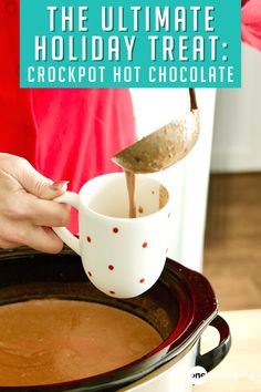 the ultimate holiday treat crockpot hot chocolate is being poured into a cup with a spoon