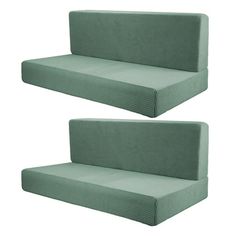 two green couches sitting next to each other