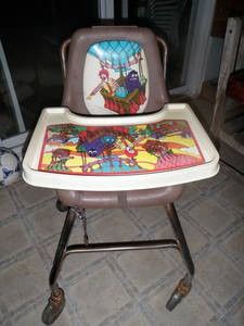 a child's high chair that has been painted