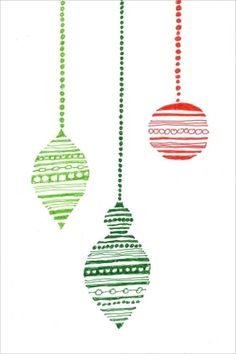 three christmas ornaments hanging from strings on a white background with red, green and blue stripes