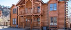 a large wooden building with balconies on the front and second story balconys