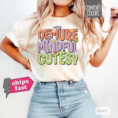 Embrace the viral TikTok trend with our "Very Demure Mindful Cutesy" t-shirt, crafted from the soft and durable Comfort Colors fabric for a cozy, lived-in feel. Perfect for those who love blending modesty with a trendy Gen Z style, this tee is not just cute but also incredibly comfortable for everyday wear. Whether you're gifting it to a girlfriend or adding a touch of casual charm to your wardrobe, this shirt is a must-have. Ideal for social media moments, workplace humor, or just expressing yo Cute Multicolor T-shirt With Slogan, Cute Multicolor Slogan T-shirt, Cute Multicolor Relaxed Fit T-shirt, Cute Spring Tops With Funny Text, Cute Multicolor Tops With Funny Text, Multicolor Kawaii Tops With Letter Print, Kawaii Multicolor Letter Print T-shirt, Spring Kawaii Multicolor T-shirt, Kawaii Multicolor Spring T-shirt