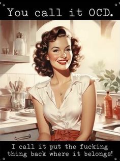 a woman is sitting in the kitchen smiling