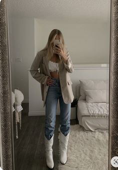 Bodysuit With Cowboy Boots, White Cowgirl Boots With Jeans, Sand Cowboy Boots Outfit, Cowgirl Boots And Blazer Outfit, Western Boots And Jeans, Cowboy Boots Outfit Beige, Cowgirl Boots Outfit With Jeans, Ripped Jeans And Cowboy Boots, White Cowboy Boots With Jeans