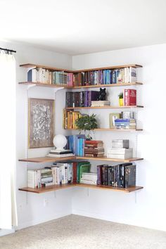 an empty room with bookshelves full of books