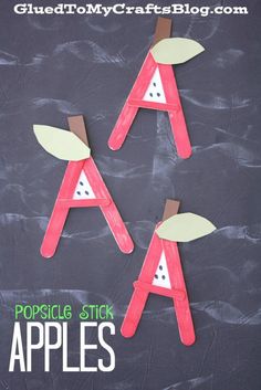 popsicle stick apples are made to look like the letter a