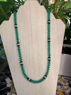 Beautiful frosted, recycled glass disk beads in green and deep teal are accented with silvertone spacers and tiny black glass beads. 20 inches with 3 inch adjustment chain. Lobster clasp closure. Adjustable Beaded Green Emerald Necklace, Adjustable Green Beaded Emerald Necklace, Single Strand Green Czech Glass Beads, Book Earrings, Deep Teal, Winter Garden, Glass Necklace, Recycled Glass, Black Glass