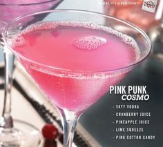 two pink cocktails sitting next to each other on top of a counter with the words pink punk cosmo written in it