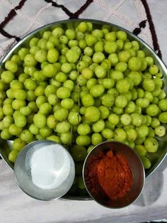 grapes and other ingredients in bowls on a table