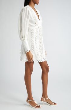 Vertical panels of three-dimensional lace butterflies bring delightful romanticism to this balloon-sleeve dress cut from crisp linen-and-silk organza. Scalloped lace frames the neckline, while a neat bow centers the Empire waist. 35" length (size 1/6) Hidden back-zip closure V-neck Long sleeves with hidden-zip cuffs Lined, except sleeves 100% linen Dry clean Imported Partially lined Designer Clothing Spring Puff Sleeve Dress With Scalloped Lace, Spring Dress With Scalloped Lace And Puff Sleeves, Elegant Puff Sleeve Dress With Broderie Anglaise, Elegant Summer Lace Dress With Puff Sleeves, Elegant Linen Dresses With Broderie Anglaise, Elegant Lace Dress With Broderie Anglaise For Spring, Feminine Linen Dress With Lace Trim, Party Dresses In Lace With Broderie Anglaise, Elegant Bishop Sleeve Dress With Lace Trim