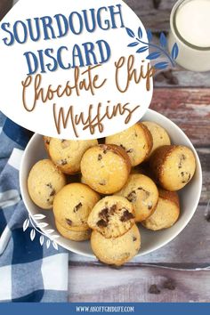 a bowl filled with chocolate chip muffins next to a glass of milk