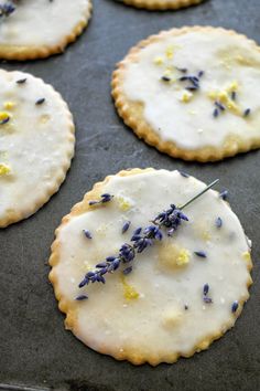 lavender shortbreads on a baking sheet ready to go into the oven with lemon zest