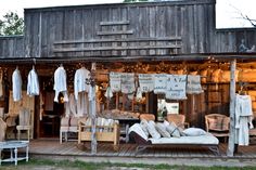 an outdoor furniture store with lots of items on display