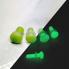 Glow Glass Plugs / Gauges for stretched ears. Single flare. Double flare also available! Sold by the pair. Glow Glass single flare plugs have a uniform lime green color during the day and glows green after being charged in bright light. We have done our best to photograph the widest range of colors and patterns but please remember these are natural stones and that the colors, shades, and patterns may vary and that the colors may not appear the same on all computer monitors. Flares can be up to 2 Styling Piercings, Cutesy Clothing, Gay Jewelry, Ear Stretching, Tapers And Plugs, Clothing Board, Plug Earrings, Colors Shades, Tunnels And Plugs