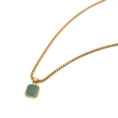 Drawing from the different shades of deep green in nature and forests, this modern necklace features a brilliant Malachite, which is known to draw out impurities, balance relationships, and bring happiness and luck. This piece was forged with stainless steel and finished with radiant gold plating, with the square pendant giving the overall piece a nice clean touch.  Expertly hand-crafted right here in Los Angeles, this necklace will give your look a simple yet bold statement look, that can be wo Plating Drawing, Green In Nature, Gold Emerald Necklace With Square Pendant, Gold Emerald Square Pendant Necklace, Gold Emerald Square Pendant Jewelry, Green Gold Necklace, Yellow Gold Malachite Pendant Jewelry, Green Malachite Spiritual Necklace, Malachite Pendant