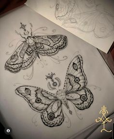 two drawings of butterflies sitting on top of each other