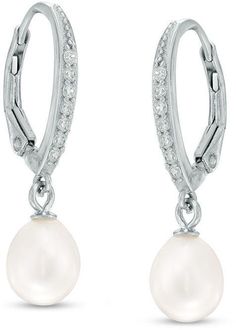 Zales 6.0 - 6.5mm Oval Cultured Freshwater Pearl and Lab-Created White Sapphire Drop Earrings in Sterling Silver Elegant Silver Oval Pearl Earrings, Classic Silver Oval Pearl Earrings, White Gold Oval Pearl Earrings, Fine Jewelry Oval Pearl Drop Earrings, Oval Pearl Drop Earrings In Fine Jewelry Style, Oval Pearl Drop Fine Jewelry Earrings, Fine Jewelry Pearl Drop Earrings, Teardrop Pearl Earrings With Lever Back, White Sapphire