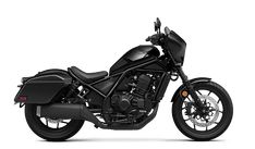 a black motorcycle is shown on a white background