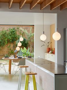 the kitchen is clean and ready to be used as a dining room or living area