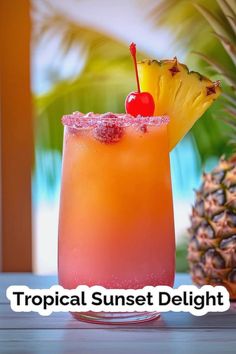 the tropical sunset delight cocktail is served in a glass with a pineapple and cherry garnish