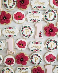 decorated cookies with flowers and the number one on them