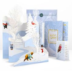 an assortment of greeting cards with winter scenes