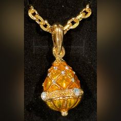 From The World Renowned Romanov Gifts Co, We Bring You The Last Available Stock Of The Iconic Brand. Imperial Empress Egg Necklace, In Beautiful Yellow Gold. The Necklace Is Cast Of Bronze, With 22k Yellow Gold-Plated Accents. Set With Austrian Crystal Gemstones, This Pendant Features A Translucent Enameling Of Yellow Gold. The Chain Is 18 Inches In Length. The Egg Pendant Measures Approximately 1 In. Height. The Chain Has An Authentic Hallmark “Faberge” Tag, With The Initials “I.F.” Engraved On Faberge Necklace, Egg Necklace, Faberge Jewelry, Rainbow Opal, Hippie Necklace, Owl Pendant, Silver Heart Necklace, Silver Plated Necklace, The Egg