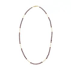 This necklace features 81 primary gemstones made of garnet, as well as spacer gemstones made of fresh water pearls and faceted zircon. The number 9 is considered significant in ancient Chinese culture, and the necklace's design incorporates this belief with its 81 gemstones. The necklace can be worn as a traditional necklace or as a glasses chain. The pendant features a white jade gemstone with a filigree design and faceted zircon tassel. The pendant can be detached from the necklace and replace Luxury Gemstone Pearl Necklace, Garnet Gemstone Necklace With Round Beads, Garnet Jewelry With Faceted Round Beads, Spiritual Garnet Gemstone Necklace, Faceted Garnet Round Bead Jewelry, Garnet Gemstone Beads Necklace, Classic Garnet Gemstone Necklace, Elegant Garnet Necklace With Faceted Beads, Elegant Garnet Necklace With Natural Stones