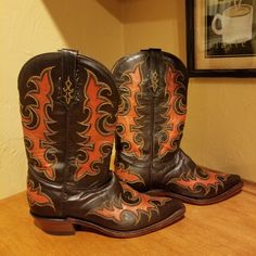 Ladies Tony Lama Dark Brown And Red Leather Cowboy Boots Size 7.5. They Are 11.5" Tall With A 13.5" Circumference And A 1.75" Heel. In Excellent Condition. Fitted Goodyear Welted Boots, Classic Red Snip Toe Boots, Western High-top Boots With Rubber Sole, Custom Snip Toe Leather Boots, Custom Leather Boots With Snip Toe, Custom Leather Snip Toe Boots, Western High-top Leather Boots, Fitted Closed Toe Boots For Western-themed Events, Red Boots With Reinforced Snip Toe