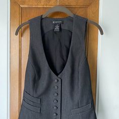 This Vintage-Style Charcoal Pinstripe Menswear-Style Vest Has Real Cloth-Covered Buttons And Two Belts/Straps Across The Back. Size 14 Petite. Tailored Pinstripe Vest For Spring, Fitted Striped Business Vest, Striped Fitted Vest For Business, Formal Striped Fitted Vest, Pinstripe Vest, Ruffle Shoulder Top, Black Chiffon Blouse, Style Vest, Navy Blue Blouse