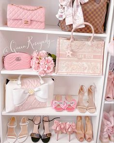 a closet filled with lots of pink and white purses