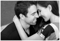 black and white photograph of a couple embracing each other