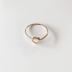 14k gold filmed wire ring with heart shaped knot Yellow Gold Wire Wrapped Promise Ring, Heart Knot Ring, Marriage Rings, Knot Rings, Ring With Heart, Heart Knot, Marriage Ring, Braided Ring, Wire Ring