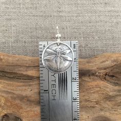 "You can find more silver treasures in my shop! Click here: https://www.etsy.com/shop/SeasideSilverJewels Or follow me on Facebook: https://www.facebook.com/SeasideSilverJewels/ The Dragonfly is a subject of intrigue everywhere it is found. You can't help but smile when you see the first one each summer. Each earring is handcrafted; all wonderfully unique and one of a kind! The ear hooks are made of sterling silver and shaped so they hang nicely and won't fall out. SIZE AND DETAIL: Earrings are Nickel-free Dragonfly Sterling Silver Earrings, Nickel-free Sterling Silver Dragonfly Jewelry, Nickel-free Sterling Silver Dragonfly Earrings, Silver Sterling Dragonfly Earrings, Handmade Silver Dragonfly Jewelry, Handmade Sterling Silver Dragonfly Jewelry, Sterling Silver Dragonfly Earrings, Silver Symbolic Pendant Earrings, Symbolic Silver Pendant Earrings