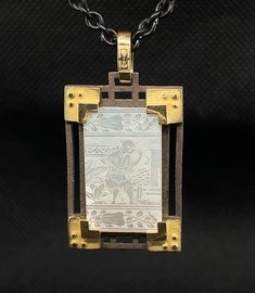 This pendant features an original antique mother-of-pearl Chinese gambling counter that has been finely engraved with a beautiful scene depicting life in 18th Century China. These gaming counters were carved in China for export to Britain, where they were used in games the way we use poker chips. Each gaming counter is set in a handmade 18k yellow gold and blackened silver mounting inspired by the architecture of Ancient China. Handmade by our jewelers in Los Angeles, this is a real conversation Antique Engraved Square Pendant Jewelry, Engraved Mother Of Pearl Pendant Necklace, Etched Pendant Jewelry For Commemoration, Antique Intaglio Pendant Jewelry, Antique Engraved Rectangular Pendant Necklace, Antique Engraved Rectangular Necklace, Antique Rectangular Engraved Necklace, Antique Engraved Necklace With Rectangular Pendant, Antique Rectangular Carved Jewelry