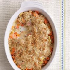 a casserole dish with meat and vegetables in it