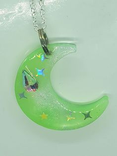 Resin pendant, entirely handmade Moon-shaped Necklace With Large Pendant For Gift, Moon Shaped Necklace With Large Pendant For Gift, Green Moon Charm Necklace, Green Moon Charm Round Necklace, Unique Green Resin Necklaces, Handmade Celestial Half Moon Necklaces, Handmade Celestial Half Moon Necklace, Unique Green Resin Necklace, Green Necklace With Moon Charm