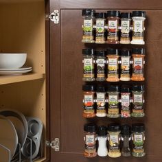 a spice rack with many different spices on it